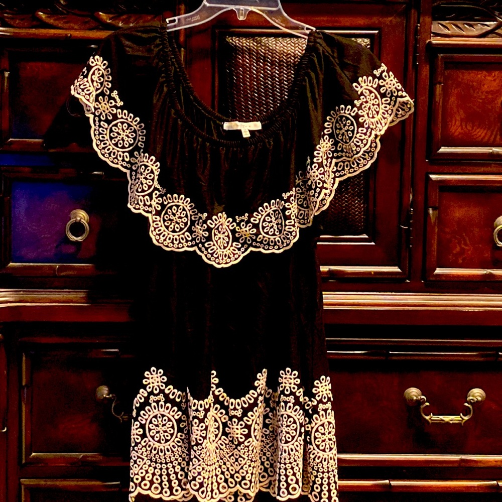 Poly knit embroidered off shoulder or on blouse